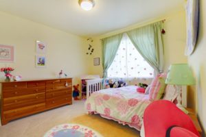 12312426 - cute green bedroom with flower bedding